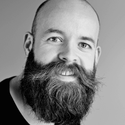 grayscale photography of man wearing crew-neck shirt