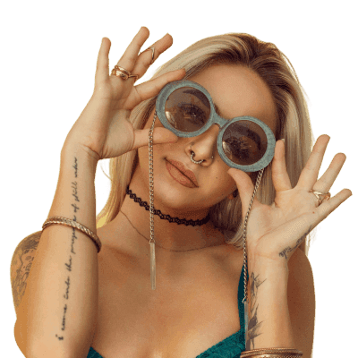 woman in blue bralette holding sunglasses putting on her eyes