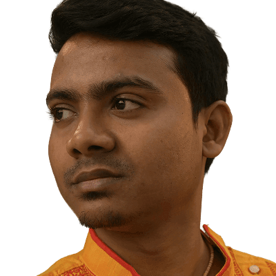 A man in a yellow shirt standing next to a tree