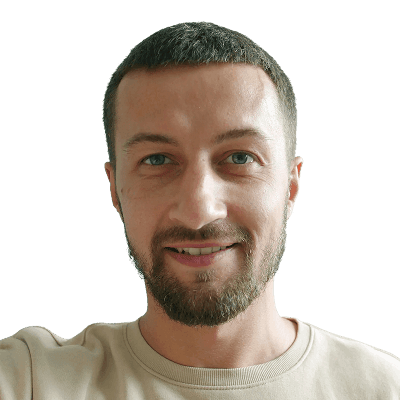 Man smiling at the camera in an office