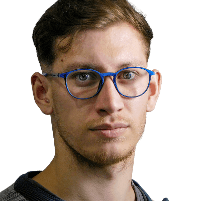 Man with glasses looking directly at the camera